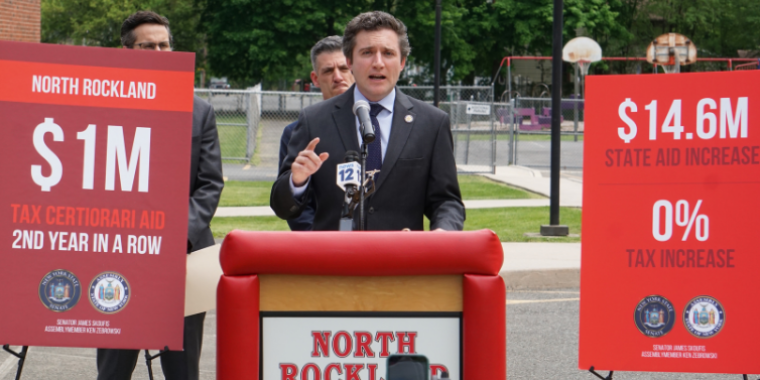Senator Skoufis applauds the NRCSD's stewardship of tax dollars and shares the good news about $1 million in special tax certiorari aid. Photo by Tom Musich.
