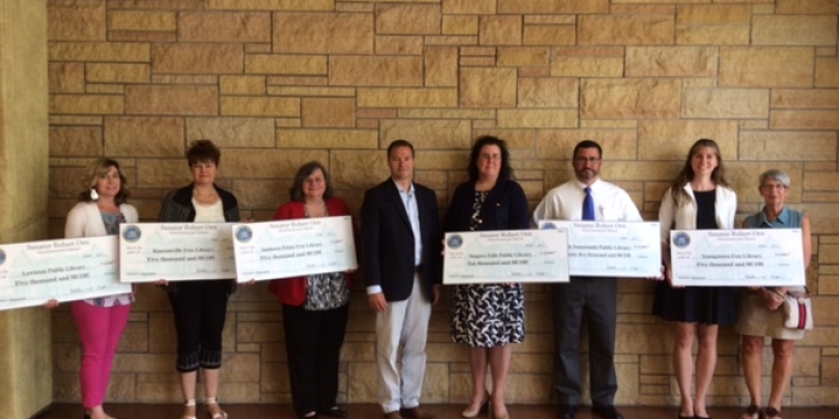 Pictured from left: Lewiston Public Library Director Jill Palermo; Ransomville Free Library Dir. Phila Ibaugh; Sanborn-Pekin Free Library Dir. Linda Deeks; Senator Rob Ortt; Niagara Falls Public Library Dir. Sarah Potwin; North Tonawanda Public Library Dir. Kevin Wall; Youngstown Free Library Dir. Sonora Miller; and North Tonawanda Library Board of Trustees Member Deborah Galas.