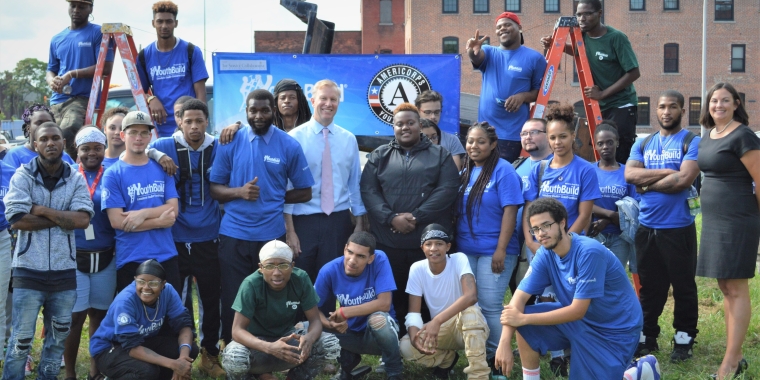 State Senator Chris Jacobs is pictured with Service Collaborative Executive Director Kate Sarata and students from the WNY YouthBuild program after announcing that he has secured $100,000 for the expansion of the program.