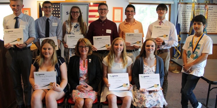 Front row: Jennifer Schenck of Union Springs High School and Cayuga-Onondaga BOCES, Senator Pam Helming, Emma Smithers of Waterloo High School, Briana McCoy of South Seneca High School. Back row: Kenneth DeLand, Maverick Coryell, Corrine Brown, Spencer Bonawitz, and Aidan Cort, all of Midlakes High School, Sean Bronson of Waterloo High School, and Giancarlo Colon from Newark Middle School.