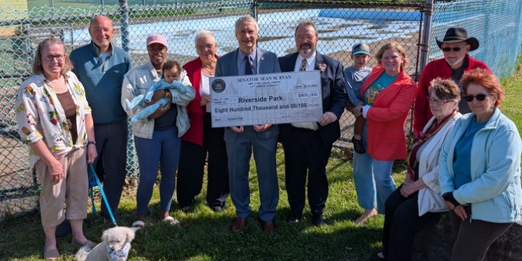 Senator Sean Ryan presents check for Riverside Park Splash Pad