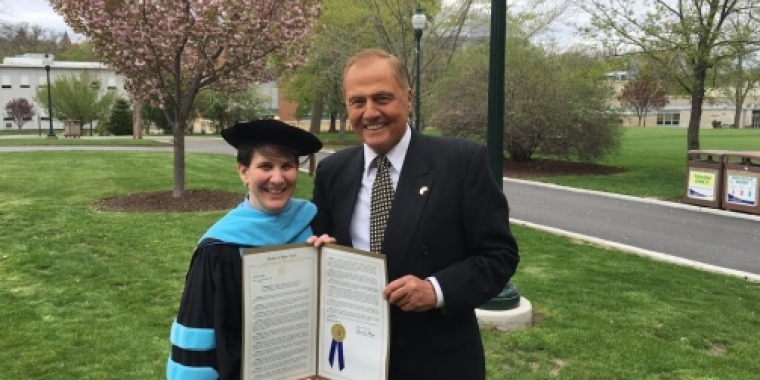 Senator Bonacic presents Dr. Kristine Young with a Senate Resolution at her Inauguration Ceremony.