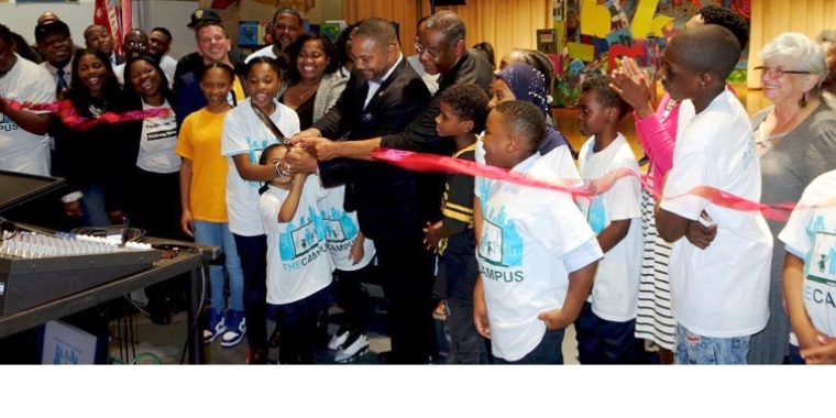 Senator Jesse Hamilton, community partners, educators, and students at the Campus ribbon cutting on October 21, 2016