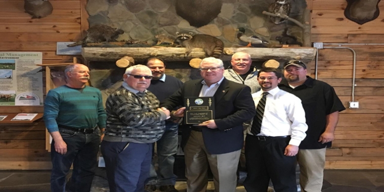 NYACD President Dan Farrand presents the "Appreciation Award" to Senator O'Mara flanked by, from left to right: Yates County SWCD Manager Jim Balyszak, Steuben County SWCD Manager Jeff Parker, Chemung County SWCD Manager Mark Watts, Tompkins County SWCD Manager Jon Negley and Schuyler County SWCD Manager Jerry Verrigni.