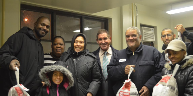 Photo: Senator Klein lends a helping hand at the Throggs Neck Houses this Thanksgiving.