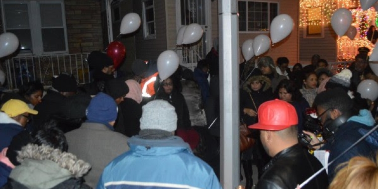 Dozens of people packed the area where the shooting took place to remember Rocky Kalisaran and show their support for his family.