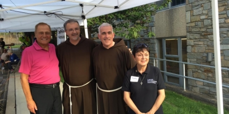 Senator Bonacic is pictured with (L-R), Fr. Salvatore Cordaro, Fr. Michael Ramos, and Kathy Mironchik.